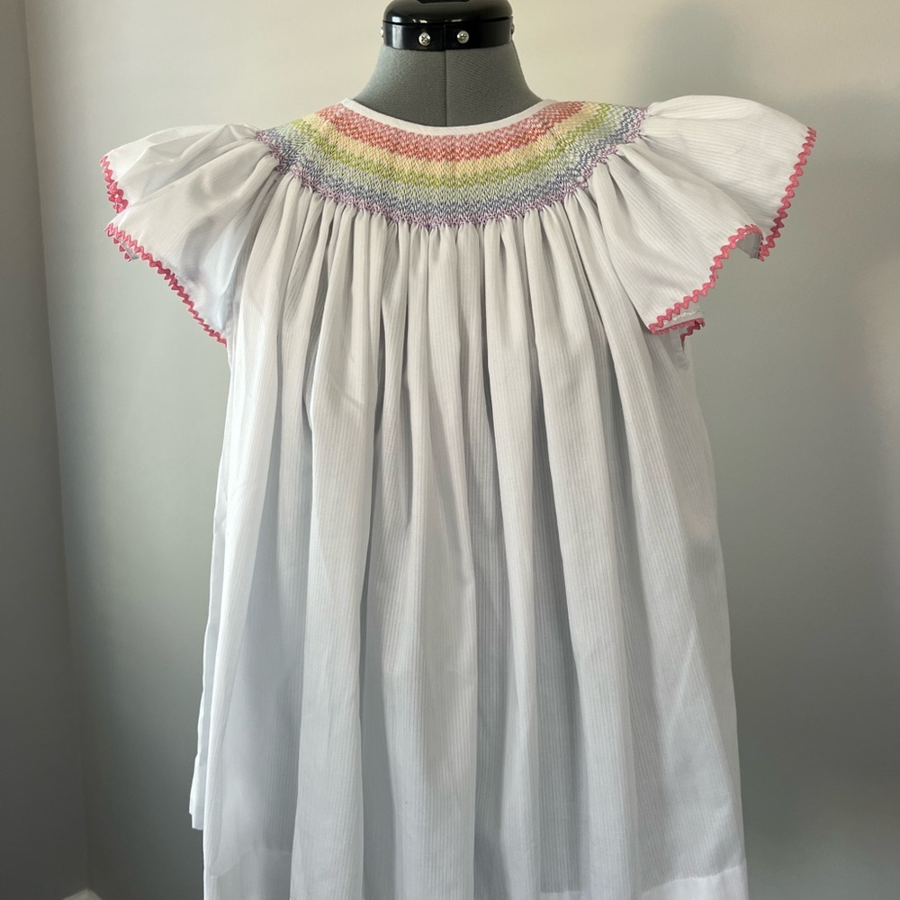 Bespoke Designer Swing dress with Rainbow Smocking